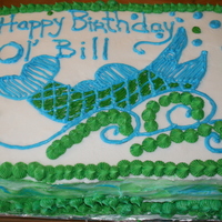 Fish Cake A cake made for friend. the green drops all over the cake represent barnacles like the ones on his boat.