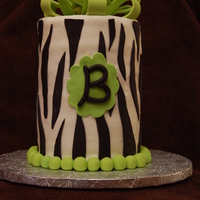 Tall Zebra Cake This is my first tall cake and my first fondant bow. Used (6) 6-inch rounds. Iced in buttercream with fondant accents. Birthday girl LOVED...