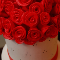3 Tier Wedding Cake Bottom tier has scrolls, middle tier has fondant heart cutouts, top tier has swiss dots with fondant rose bouquet topper. This was my first...
