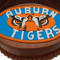 Chocolate Auburn Tiger Eyes Chocolate Buttercream with Auburn Tiger Eyes made of fondant