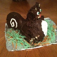Squirrel Cake Made this for my neighbor to say thank you for the squirrel feeder he made for me!! I know it looks more like a fat cat!! Tail and head are...