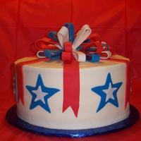 4Th Of July Cake White cake with raspberry mousse. Accents are fondant.