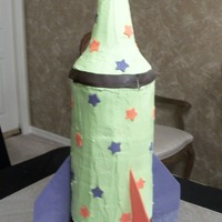 Children's Rocket Birthday Cake Nine-layer 30-inch tall birthday cake for 3-year-old grandson. Cone portion made of rice krispies treats. Buttercream with fondant/gumpaste...