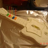 Guitar Hero Cake This was made as a birthday cake. Key Lime flavored cake and butter cream frosting. Slices of lime for details
