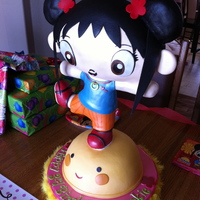 Kia Lan!!! Brooklyn's Kia Lan Birthday cake. She is made out of Rice crispy treats, covered in chocolate and then fondant. Mr. Sun is chocolate...