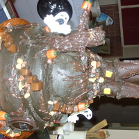 Chocolate Haunted Castle Triple layer Devil's Food chocolate cake, chocolate covered ice cream cones for towers, marshmallow, chocolate covered haunted tree,...