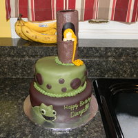 Birthday Cake For Tangled/rapunzel Party Two tiered birthday cake for birthday party with a Rapunzel ("Tangled") theme. Covered with fondant. Tower is made from stacked...
