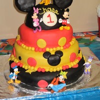 Mickey Mouse Theme Birthday Cake I made this cake for my little guy's 1st birthday party. The Mickey Mouse hat at the top is actually made from styrofoam that I cut...