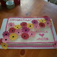 Daisy Bridal Shower Cake This was my first try at making gumpaste flowers. All the daisies are gumpaste. The cake is a cake mix because the buyer had a really small...