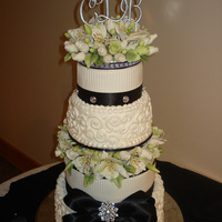 Bright Wedding With a nightmare cake wreck on the second layer, I managed to patch it back together and make it "somewhat" presentable. Not real...