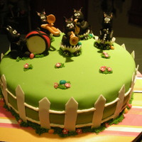 Black Cat Band My neighbor has a Dixieland Band that marches in the Easter parade. The cats and fence are fondant and the instuments, eggshells, and...