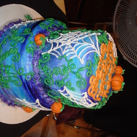 Pumpkin Patch A hybrid birthday/Halloween bash cake, the top tier is Golden Butter cake with Fresh Raspberry filling, the bottom tier is Chocolate Butter...