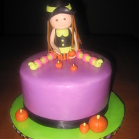 Halloween Birthday Cake Sprinkle cake with vanilla filling. I made this cake for my daughters 6th birthday party (halloween theme) to sit atop a cupcake tower.