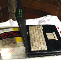 Laptop And A Book This is my first laptop cake made for my husband's birthday. Behind it, supporting the screen, is his written book. I wrote everything...