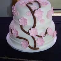 Cherry Blossom Branch My first wedding cake ... very exciting. I did this cake for a friend who wanted the ever popular Cherry Blossom Branch. The tiers are 10...