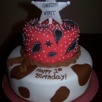 Little Cowboy's First Birthday This cake was for a little guy's first birthday. I guess since the boy's name is Wyatt, the mom is obsessed with everything...