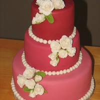 Wilton Course 3 Final Cake This is my final cake for my Wilton Course 3 class. It is a fondant cake with darkening shades of burgandy and fondant roses. The top and...