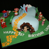 In The Night Garden Number 1. Customer supplied the figurines but this cake was a lot of fun to make. Cake is white raspberry mud and covered in fondant.