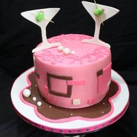 Pink Martini Cake 7in Cake filled and covered in white chocolate ganache and Albert Uster Fondant.