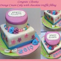 Girlie Graduation Cake Made this cake for my best friend's graduation from college. Two 8in square & the top is a styro dummy. First time making fondant...