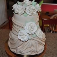 Caryn's Cake Small round MMF wedding cake with gumpaste roses