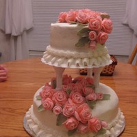 Pink Tiered Roses This was the grand finale cake for Course 3. The roses took forever but turned out nicely. admittedly the icing job is sloppy but it still...
