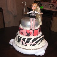 Bratz Cloe Glitter Leopard Zebra 7Th Birthday Cake My daughter loves animal prints and Bratz! So, when I found this Cloe doll it inspired me to make her cake after it. The top tier glitters...