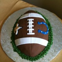 Super Bowl Used a Wilton football pan mold & covered the cake in fondant