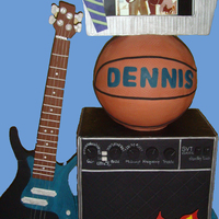 Happy 40Th Bday All in fondant. The top has a gumpaste frame that holds a digital picture frame to scroll the life of the Bday boy in pictures ;-)