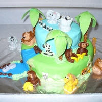 Jungle Baby Shower Cake everything is made out of fondant. The cakes on CC were a great source of inspiration.TFL