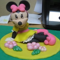 Minnie Mouse Made With Gumpaste Minnie Mouse by a client request. Made all with gumpaste. Minnie Mouse hecha a mano en masa de goma.