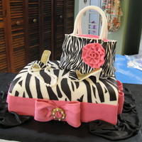 Zebra, Purse And Shoe Quincea?era Cake My first Quincea?era cake. The humidity and hot weather in Puerto Rico make my work a lot difficult, but I pleased with the results. Sorry...