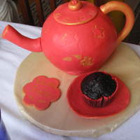 Tea Pot My second 3D cake ever. yellow butter cake with orange IMBC filling and covered in fondant. I had lots of accidents, I had to bake the cake...