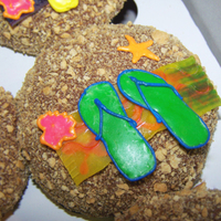 Flip Flop/beach Cupcakes Made for a friends birthday. Pictures taken by my boyfriend since i had to work :( They are White cake (dyed blue) and chocolate frosting....