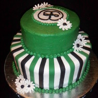 Daisy Bridal Shower Cake This cake was made for my cousins bridal shower. The bride and grooms names are Ernest and Elyse. The symbol on the top was from their save...