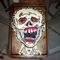 Zombie Cake This cake was made for my friend's going away party. He loves Zombies and even got the same image that I used for inspiration for a...