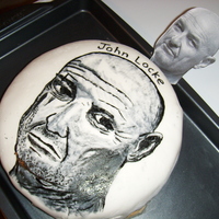 John Locke From Lost John Locke from the TV show LOST painted on fondant covered cake.