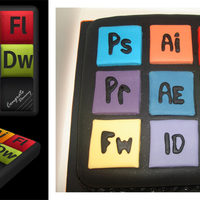 Multimedia Graduation Cake was designed by multimedia graduate - keys are acronyms of software he works with...PS - Photoshop ...FW- fireworks etc - His pic is...