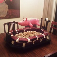 Pig Roast This cake was so much fun! Pig is RKT, red velvet bricks with cream cheese mortar and toasted marshmallow coals. The pig was motorized and...