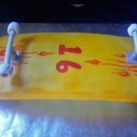 Skateboard Chocolate fudge cake with fondant icing and accessories.