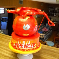 Bakugan - Ultra Dragonoid This cake is a 10in round on the bottom, stacked on top is the Dragon ball that opens up to make the Ultra Dragonoid on top.