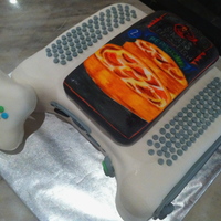 Xbox Cake With Red Baron Pizza Box This was another xBox cake I did for a groom's cake, but the bride asked me to include a replica of a Red Baron pizza box on top. The...
