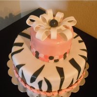 Pink, Black, White Zebra Patten First attempt at making a bow, so it needed help but for my 3rd fondant, I was pleased.