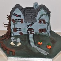 Haunted House Halloween haunted house. Vanilla sponge cake. Vanilla buttercream. Covered with fondant