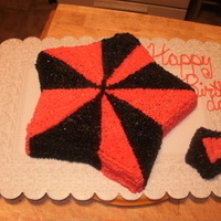 5 Point Star This is a chocolate cake with red and black buttercream icing.