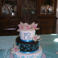 Christina's Graduation My niece requested this cake for her Chapman University graduation. Marble, Chocolate and Vanilla cakes. GP lettering with sequins added....