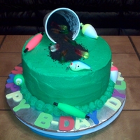 Fishing Bait Strawberry cake, strawberry bc with sliced strawberries. Crushed oreos for the dirt and gummy worms.