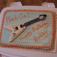 Guitar Birthday Cake This is a cake that I made for my husband's 40th birthday. His dream guitar has always been a flying V. So, I was inspired by two...