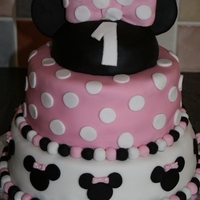 Minnie Mouse This is my second ever fondant cake, done for my nieces first birthday. This cake was of course inspired by several of the same design here...