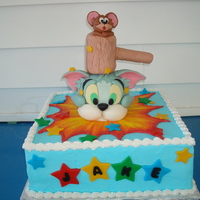 Tom And Jerry Tom and Jerry cake. Both made from Rice Crispy Treats covered in fondant.